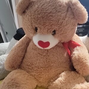 Adorable Brown Teddy Bear with Red Bow
